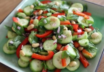 Cucumber salad with peanuts, red peppers, lime juice, and mint
