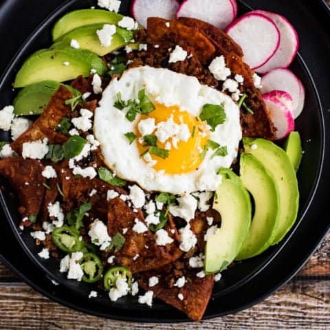 Chilaquiles with chorizo and red chile sauce