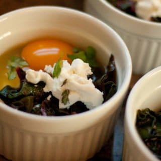 baked eggs with goat cheese and kale