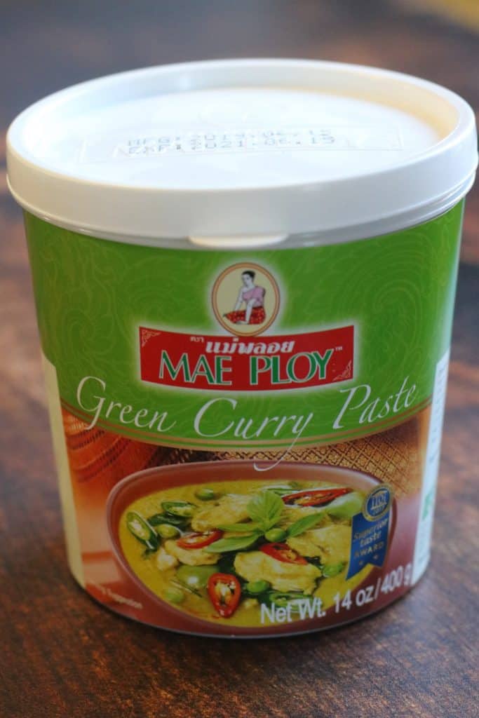 A contiainer of Mae Ploy brand Thai green curry paste