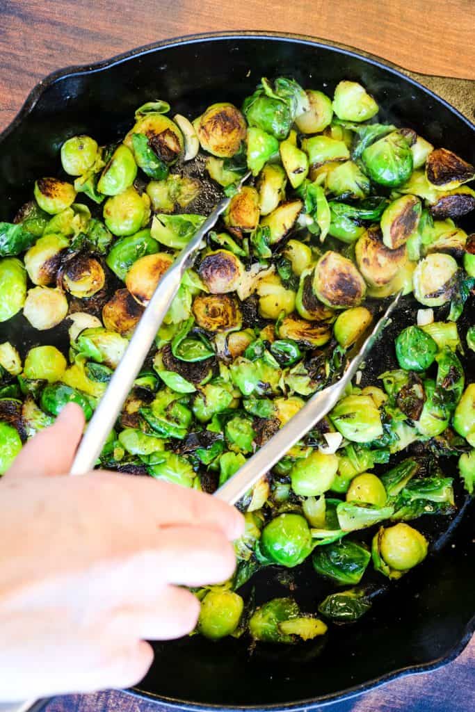 Cooking brussels sprouts in a cast iron pan