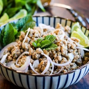 A traditional larb recipe consisting of meat, onions, and mint.