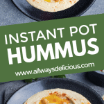 Instant pot hummus served on a black plate.