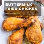 Promotional image for air fryer buttermilk fried chicken featuring cooked chicken legs on a plate with a bold caption overlay.