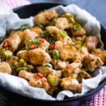 Close up, low angled shot of air fryer fried salt and pepper chicken.
