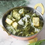 low angle shot of a bowl of instant pot palak paneer