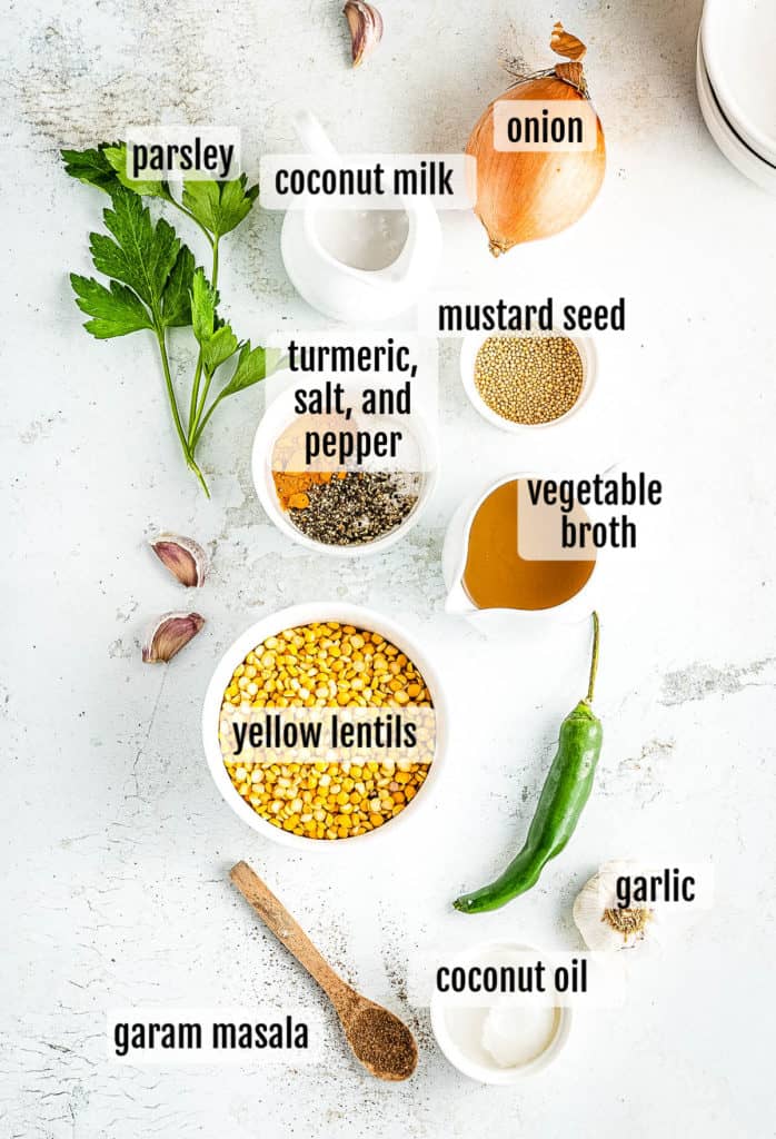 Overhead shot of the ingredients needed to make dal soup or Indian spiced lentil soup