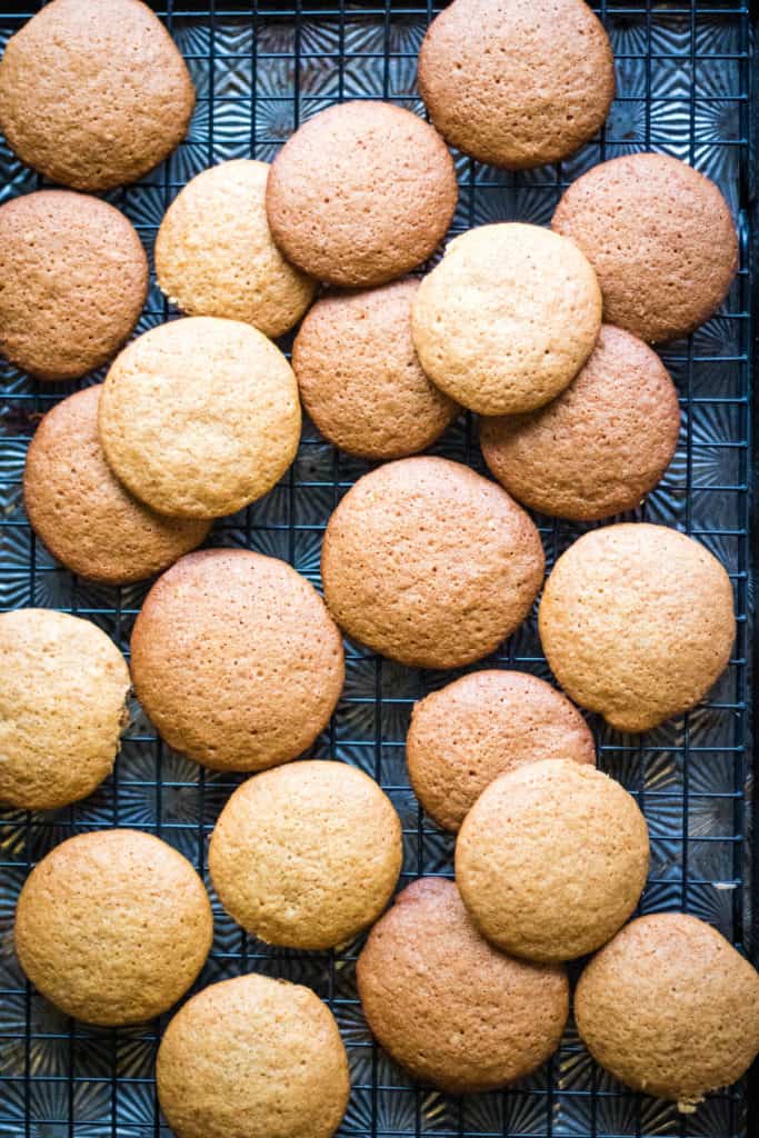 Ginger and honey cookies on a cooling rack.