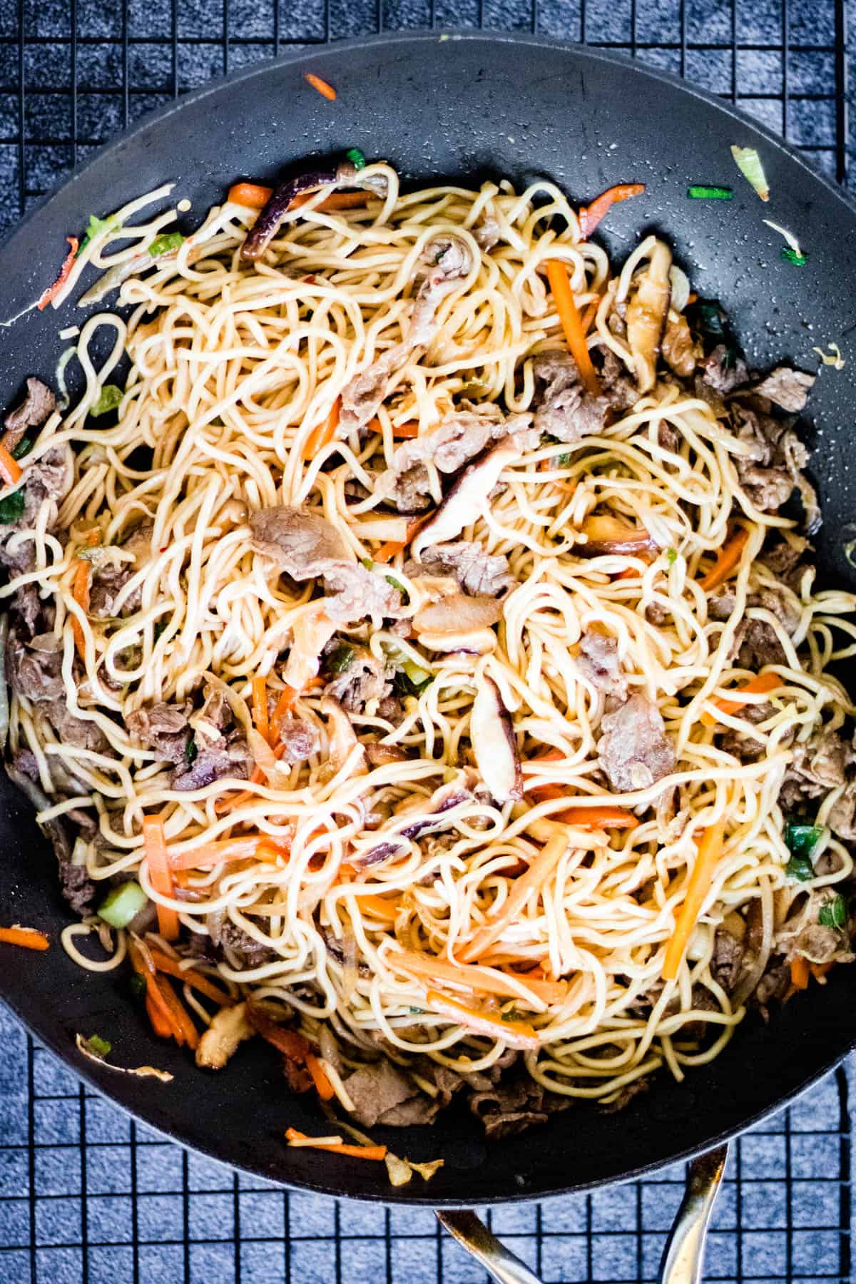 A beef yakisoba with noodles, meat and vegetables.