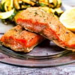 Low angle, closeup shot of the cooked salmon on a plate.