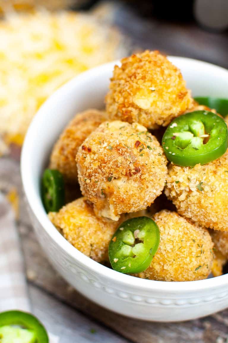 Low angle shot of a bowl of air fryer jalapeno popper bites.