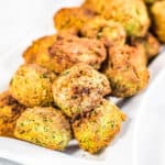 Low-angle closeup shot of a pile of air fryer falafel balls.
