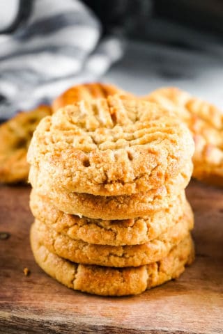 High angle shot of a stack of peanut butter cookies.