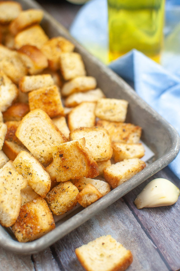 Close up shot of croutons on a baking pan.