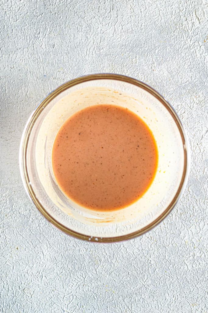 A bowl of chicken sauce.