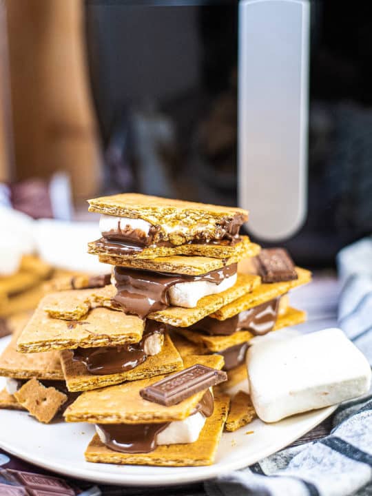 Low angle shot of air fryer s'mores on a plate, ready to eat.