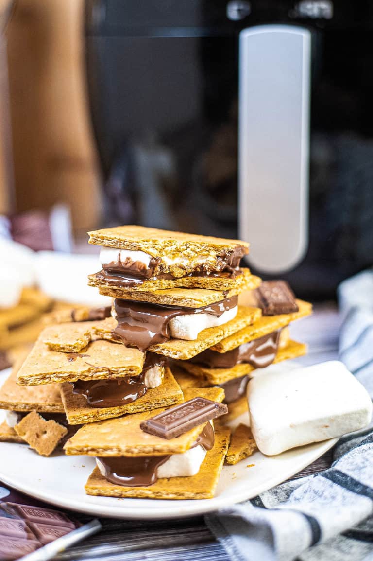 Low angle shot of air fryer s'mores on a plate, ready to eat.