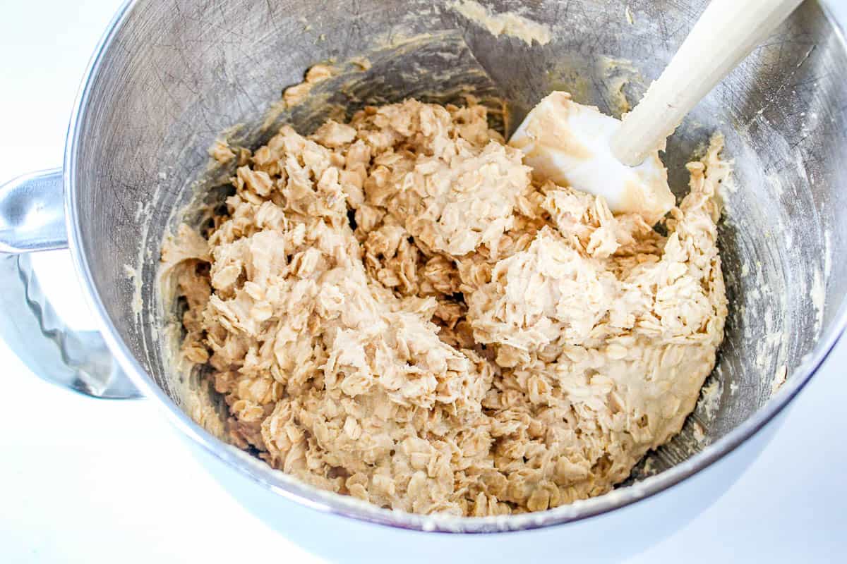A mixing bowl with dough for Quaker oatmeal cookies.