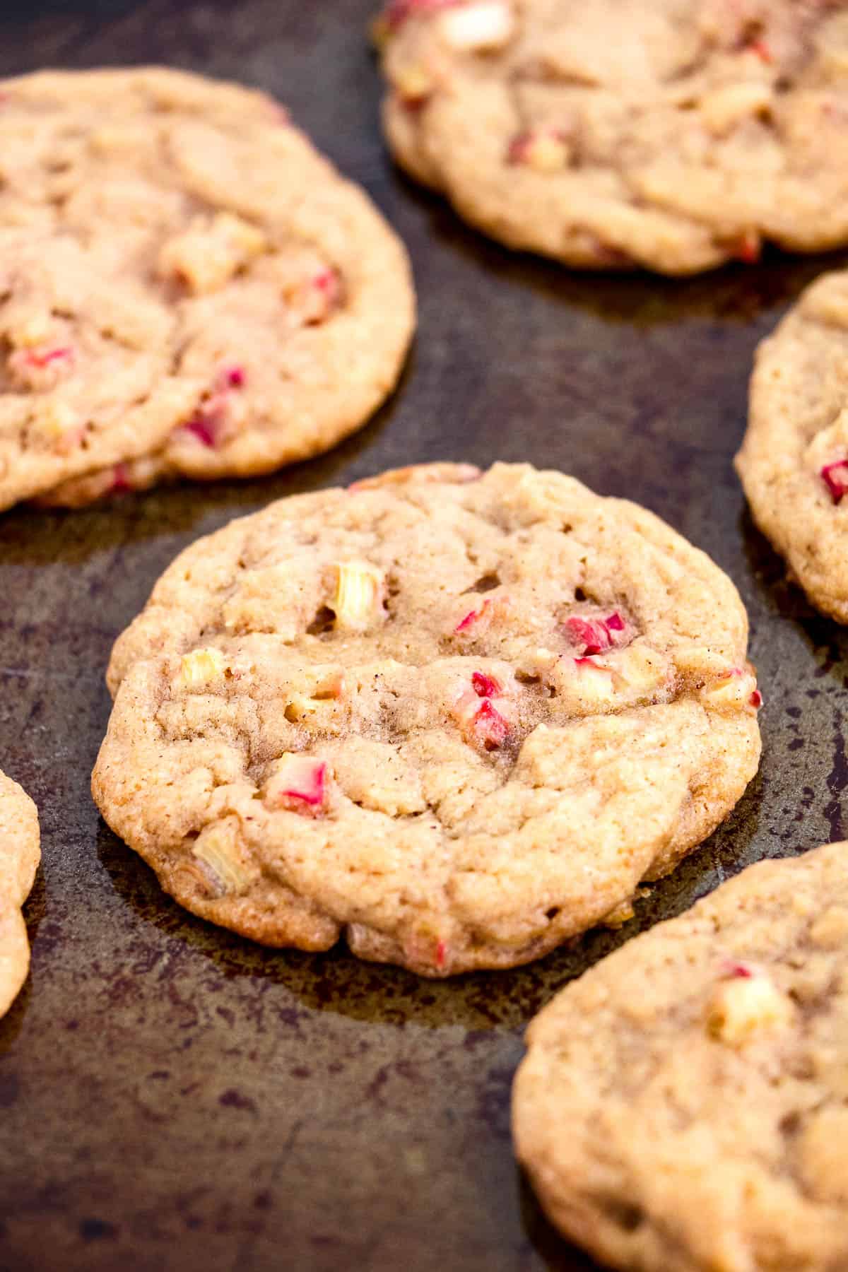 Baked rhubarb cookies on a baking sheet.
