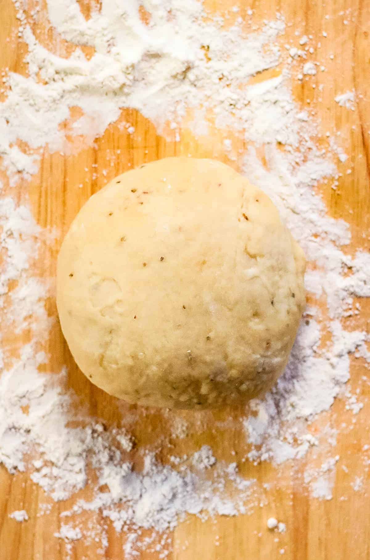 overhead shot of a ball of samosa dough.