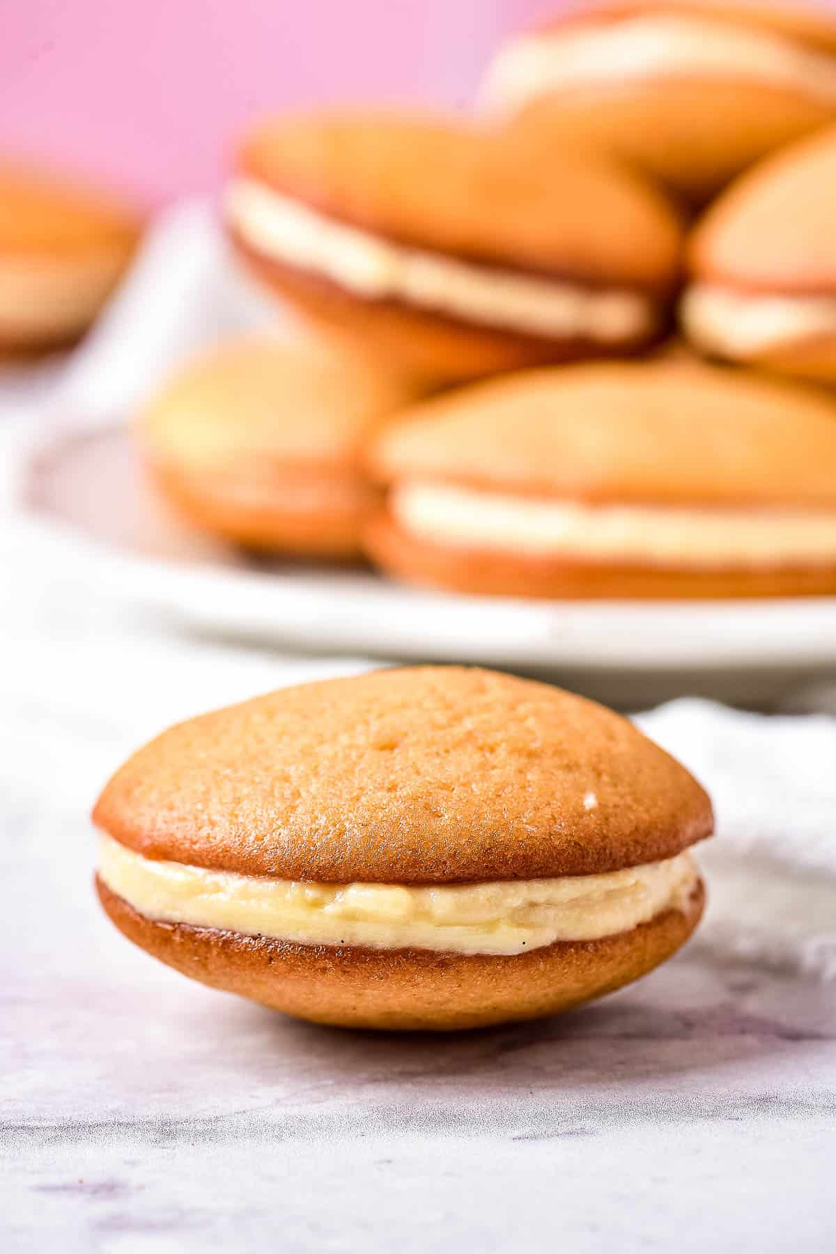 low angle shot of a pile of caramel whoopie pies.
