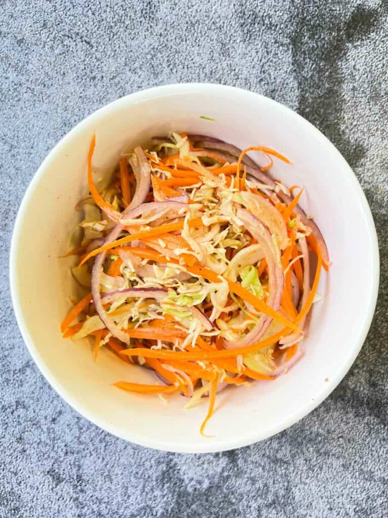 onion salad mixed in a bowl.