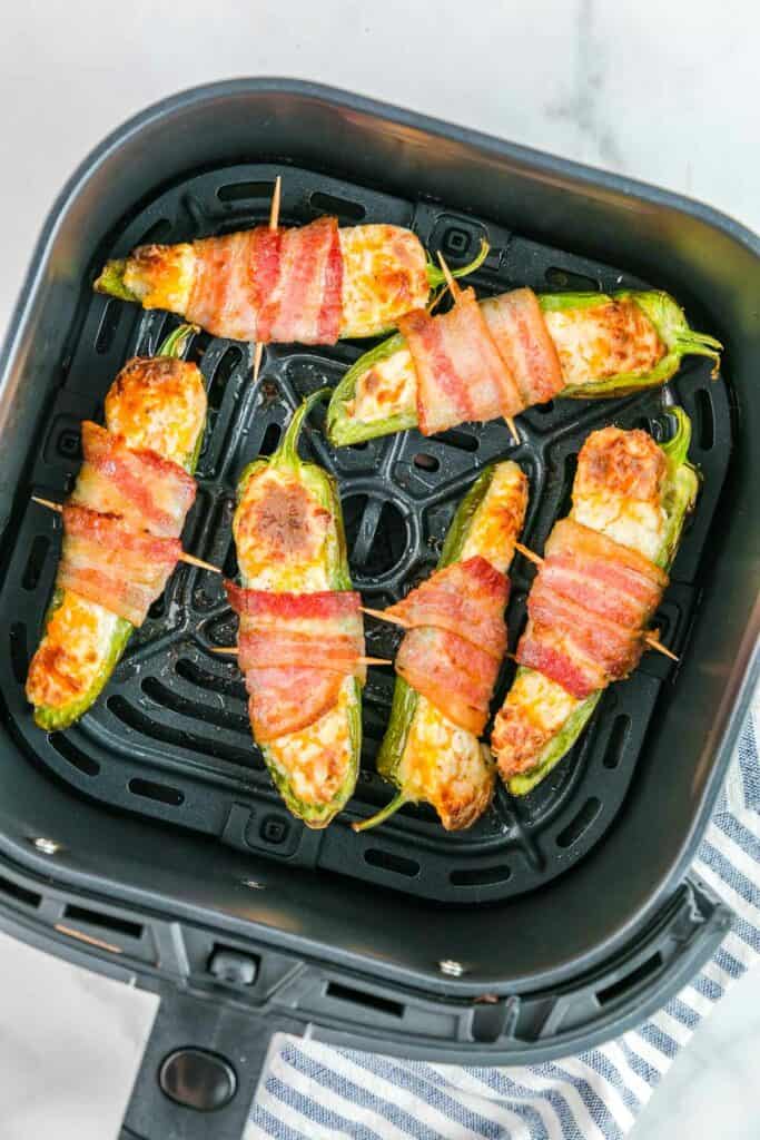 Bacon wrapped jalapenos in an air fryer.