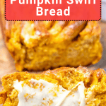 A sliced loaf of pumpkin swirl bread with a pat of butter melting on one slice, displayed on a wooden surface.