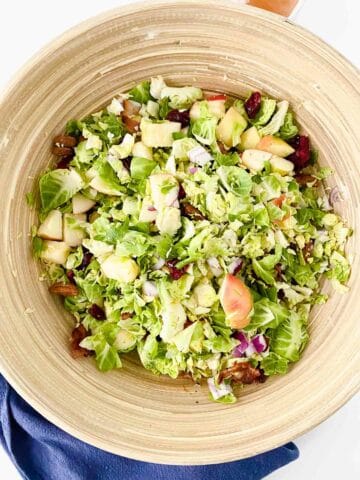 A bowl of brussels sprout salad.